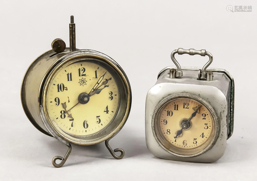 2 small travel alarm clocks,