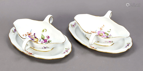 Two gravy boats with fixed saucers,