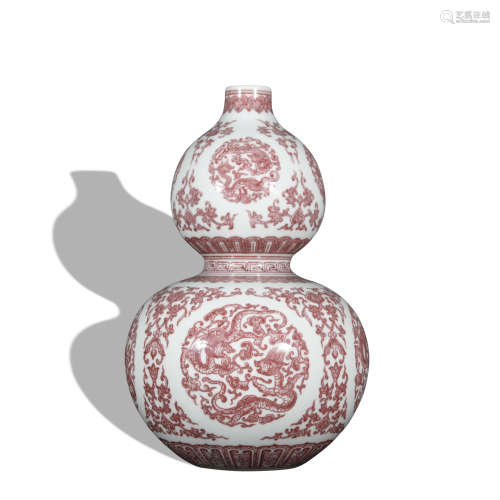 A copper-red-glazed 'dragon' gourd-shaped vase