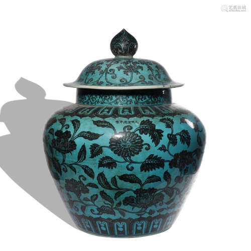 A blue glazed 'floral' jar and cover