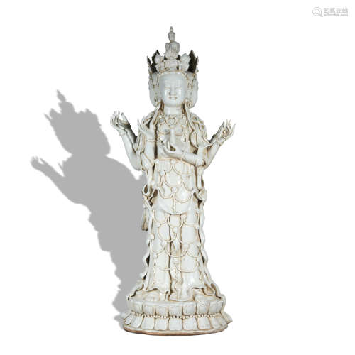 A celadon-glazed statue of Guanyin