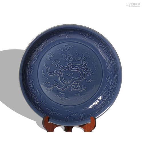 A blue glazed 'dragon' dish