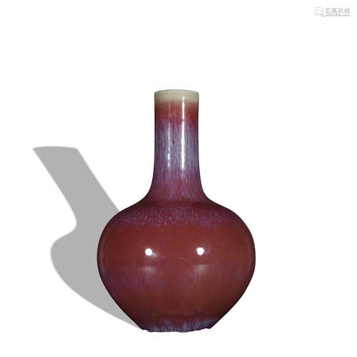 A flambe glazed globular vase