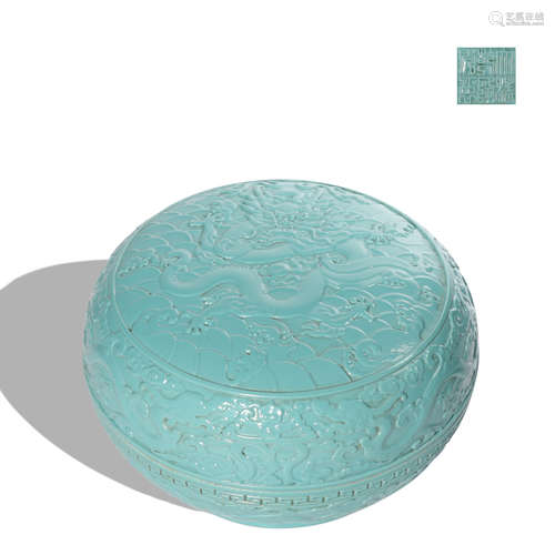 A celadon-glazed 'dragon' box and cover