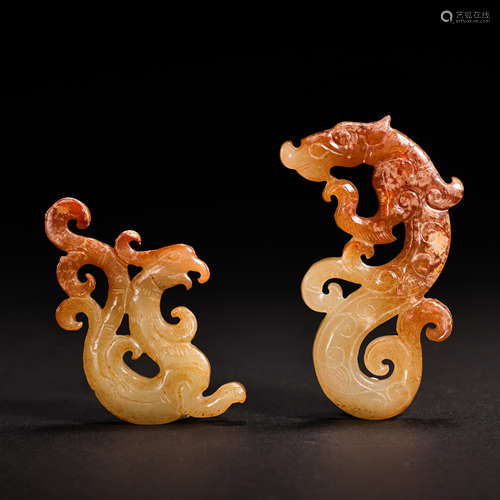 A GROUP OF HETIAN JADE DRAGON AND PHOENIX,ZHANHAN PERIOD, CH...