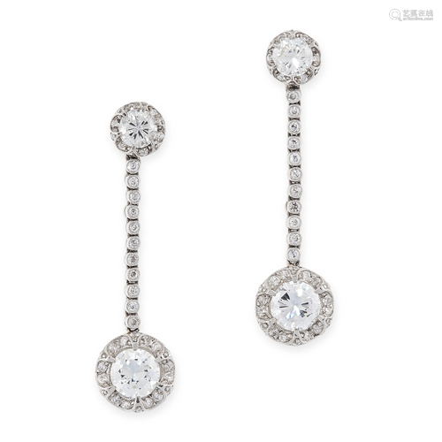 A PAIR OF DIAMOND DROP EARRINGS each set with a