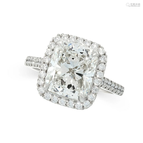 A 4.08 CARAT SOLITAIRE DIAMOND RING in platinum, set