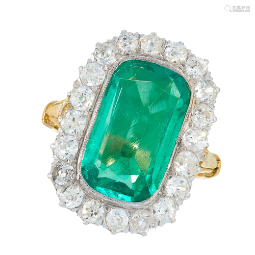 A FINE COLOMBIAN EMERALD AND DIAMOND DRESS RING in high