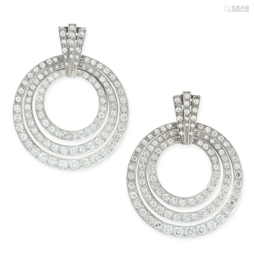 A PAIR OF DIAMOND EARRINGS each formed of three
