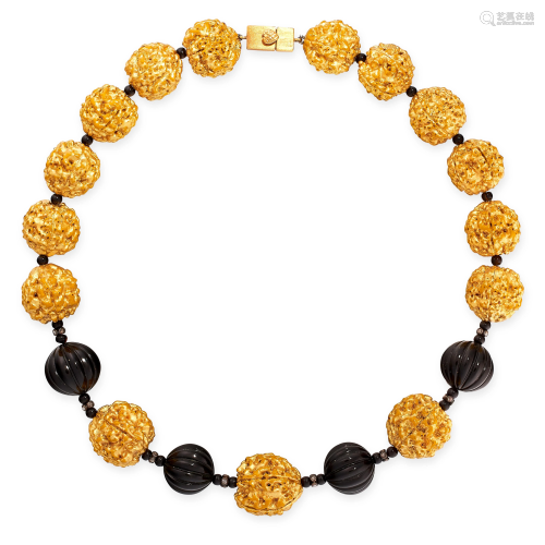 A DIAMOND AND ONYX BEAD NECKLACE in 18ct yellow gold,