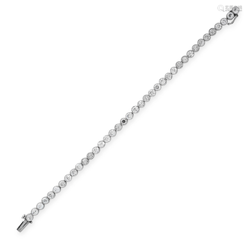 A DIAMOND LINE BRACELET, CIRCA 1940 in platinum,