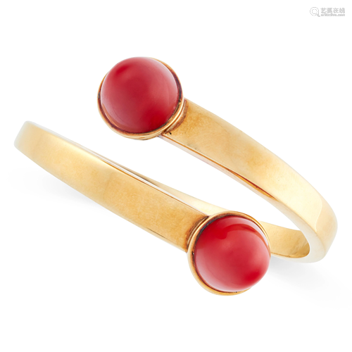 A VINTAGE CORAL BANGLE in 18ct yellow gold, the hinged