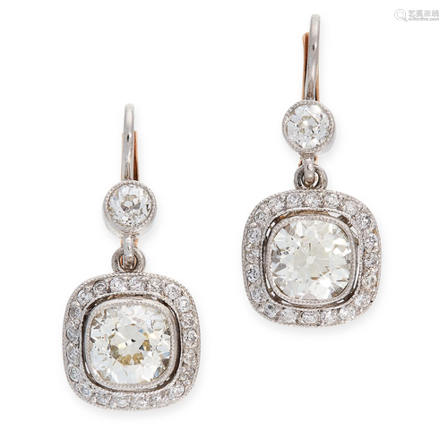 A PAIR OF DIAMOND DROP EARRINGS each set with a cushion