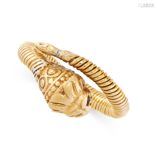A LION'S HEAD RING, ZOLOTAS in 22ct yellow gold, the
