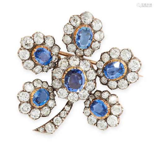 AN ANTIQUE SAPPHIRE AND DIAMOND FLOWER BROOCH in yellow