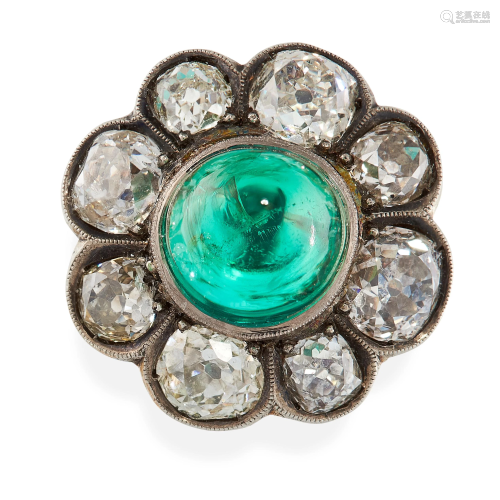 AN ANTIQUE EMERALD AND DIAMOND RING in yellow gold, set