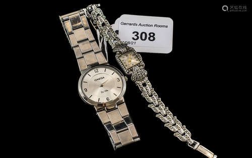 A Ladies Marcasite Cocktail Wristwatch together with a copy ...