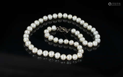 String of Large Fresh Water Pearls with silver clasp, 17 inc...