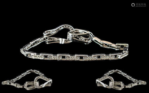 A 9ct White Gold Diamond Bracelet approx 1ct of diamonds. Le...