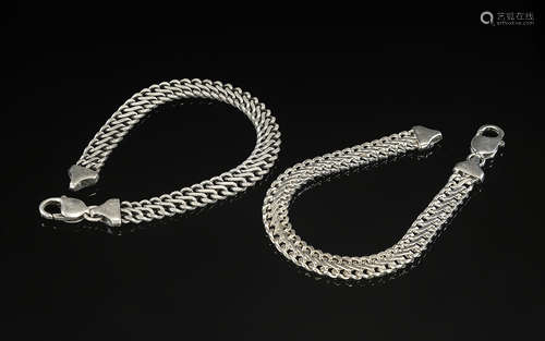 A Fine Quality Pair of Sterling Silver Bracelets. Both with ...