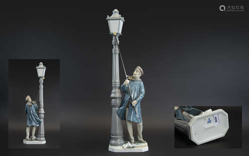 Lladro Hand Painted Tall Porcelain Figure 'Lamplighter', mod...