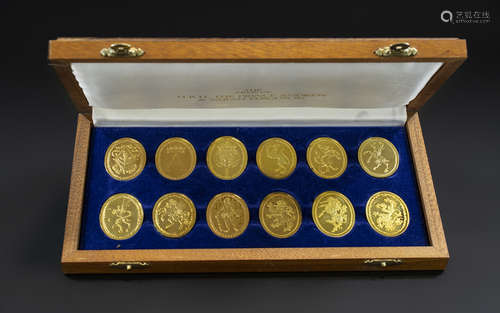 A Set of ( 12 ) Ltd Edition Gilt on Silver Medallions. The A...