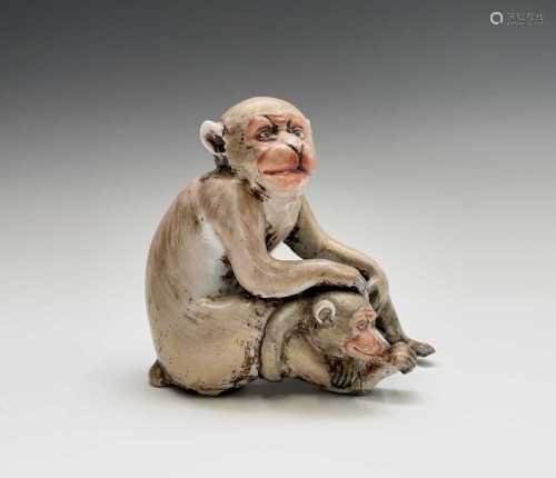 A Chinese porcelain group of monkeys, 19th century, height 1...