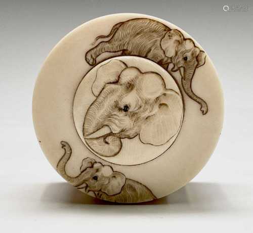 A Japanese ivory circular box and cover, Meiji Period, the d...