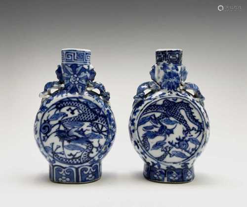 A pair of small Chinese porcelain blue and white moon flasks...
