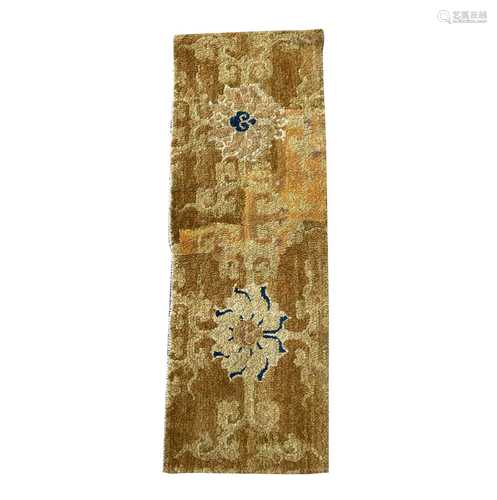 A Chinese rectangular rug fragment, 19th century, with scrol...