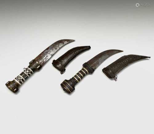Two Middle Eastern daggers, circa 1900, largest length 29cm.