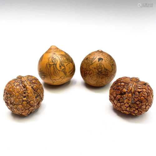 Two Chinese carved walnuts, circa 1900, profusely carved wit...