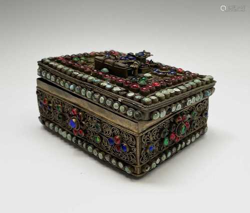 A Tibetan gilt metal box, early 20th century, with turquoise...