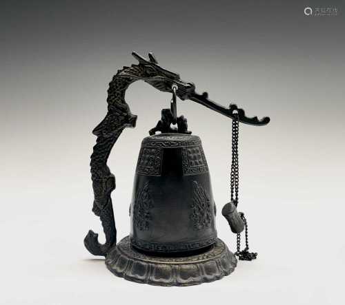 A Chinese bronze dragon bell, early 20th century, height 15....