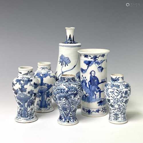 Four small Chinese porcelain blue and white baluster vases, ...