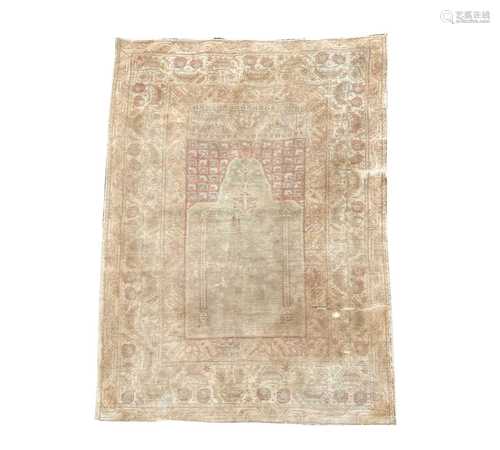 An Ottoman silk prayer rug, Anatolia, 19th century, the cent...