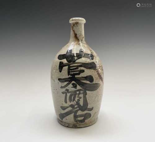 A Chinese stoneware bottle, probably 19th century, painted w...