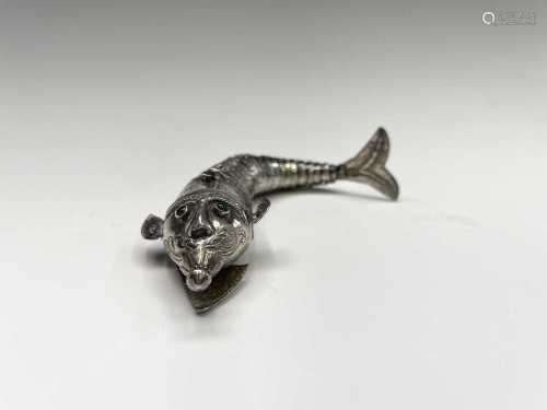 An articulated white metal novelty fish, with blue cabochon ...