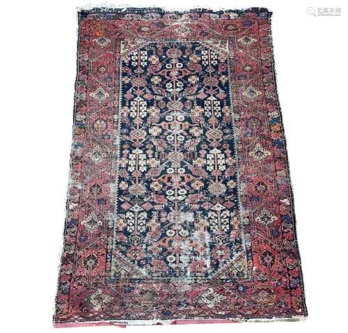 A Malayer rug, West Persia, circa 1900, the indigo field wit...