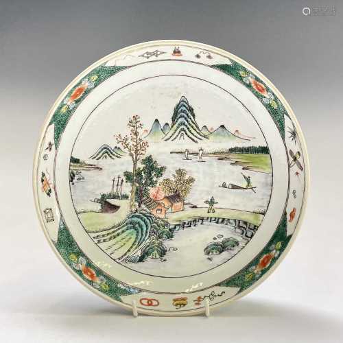 A Chinese famille verte porcelain dish, painted with a coast...