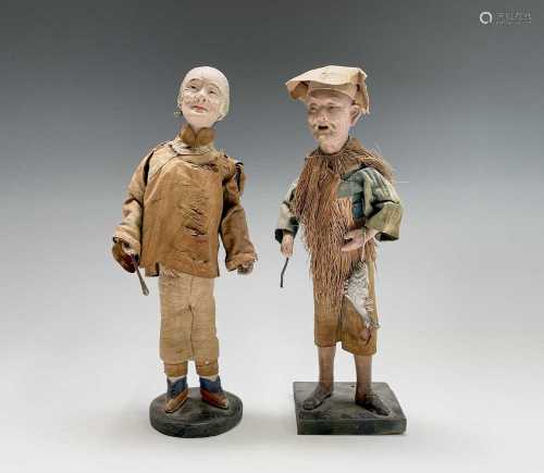 Two Japanese bisque porcelain figures of fisherman, early 20...