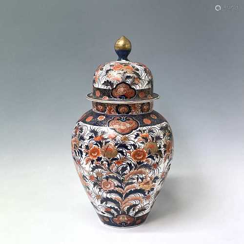 A large Japanese Imari porcelain baluster vase and cover, 19...