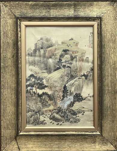 A Chinese painting on silk of a landscape scene, with callig...