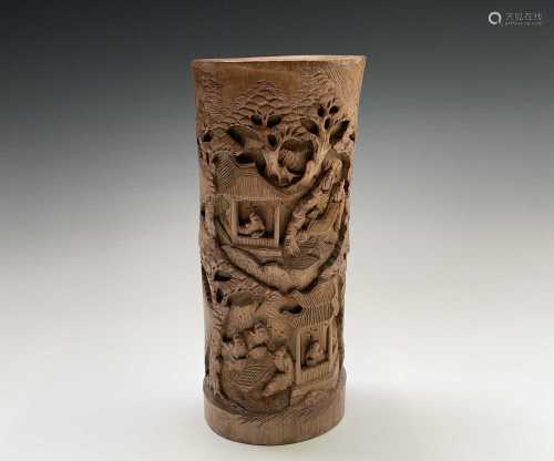 A Chinese bamboo brush pot, 20th century, carved with figure...