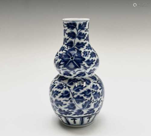 A Chinese porcelain blue and white double gourd vase, 19th c...