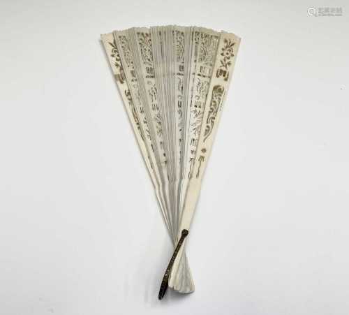 A Chinese ivory fan, circa 1920, with foliate decrated pierc...