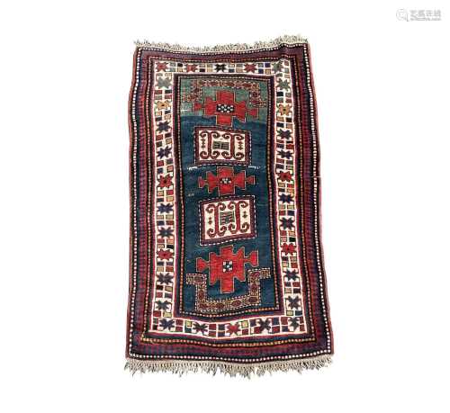 A Karachov Kazak dated rug, circa 1910, the green and blue a...