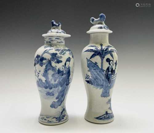 Two Chinese porcelain blue and white baluster vases and cove...