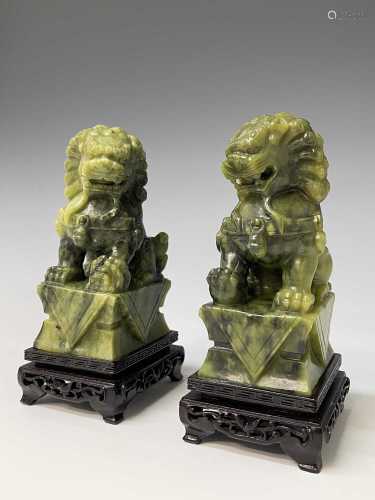A pair of Chinese 'jade' temple lions, 20th century, height ...