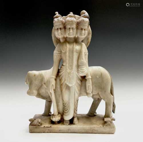 An Indian alabaster group of Dattatrayer, circa 1900, the th...